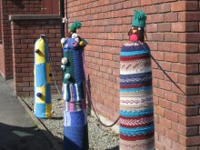 Hope Village Hall Knitted Bollard Covers